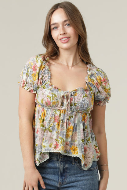 Angie Floral Print SS Lace Trim Hanky Hem Top Bay
