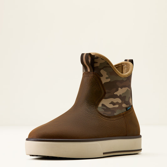 A brown leather ankle boot with a camouflage patterned side panel, a tan pull tab, and a thick off-white platform sole, shown against a plain light beige background.